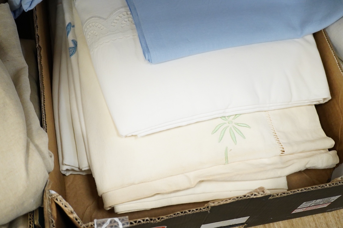 Thirteen mixed French mostly coloured provincial linen sheets some embroidered with monograms, floral embroidery, or decorated with crochet.